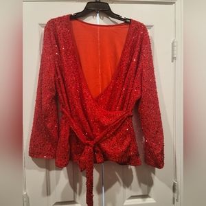 Red sequin peplum top